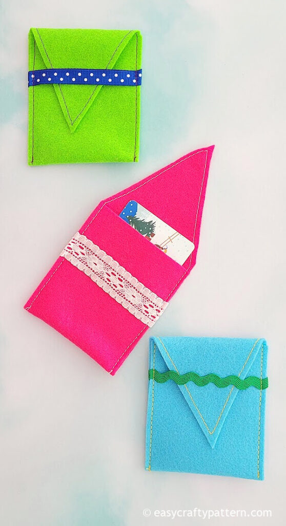 Green, pink, blue small envelopes.