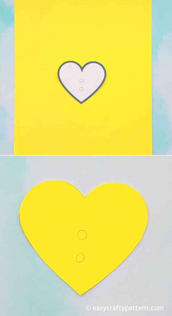 Tracing Heart Shape On Yellow Paper.