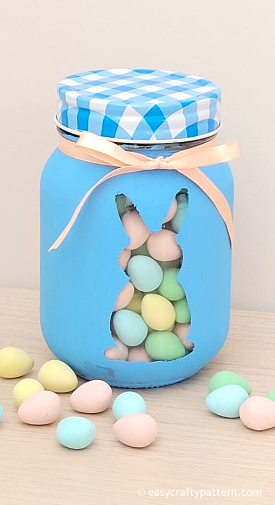 Blue mason jar with candy.