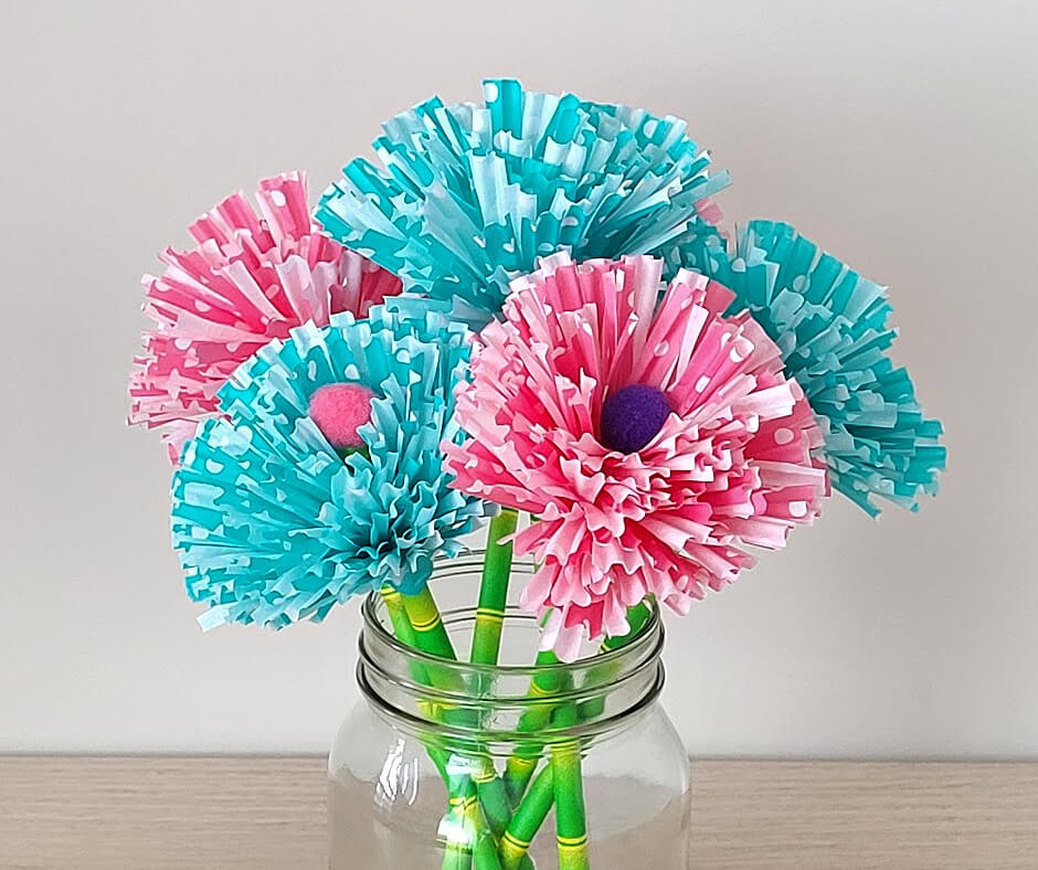 Pink and blue cupcake liner flower.