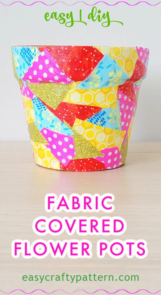 Colourful fabric covered flower pot.