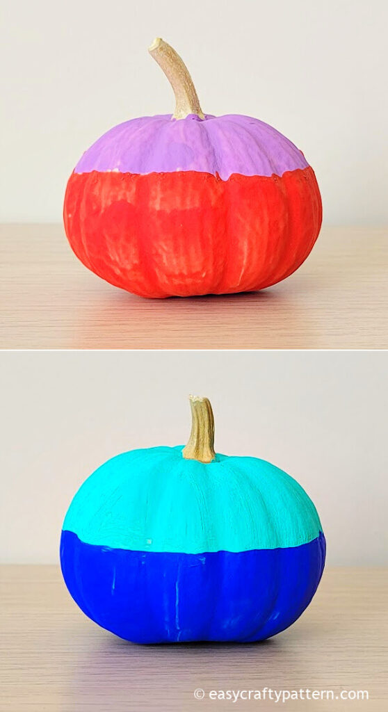 Painted pumpkins with red, blue, purple.