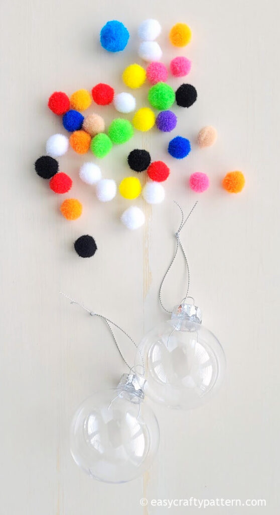 Pompom and clear plastic balls.