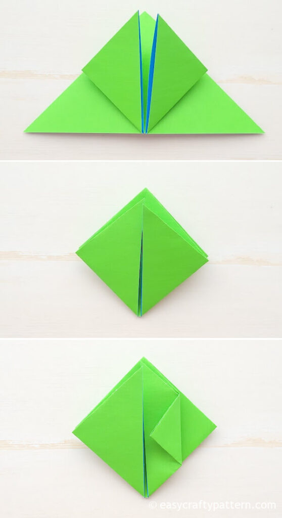 Folding green paper into diamond shape.