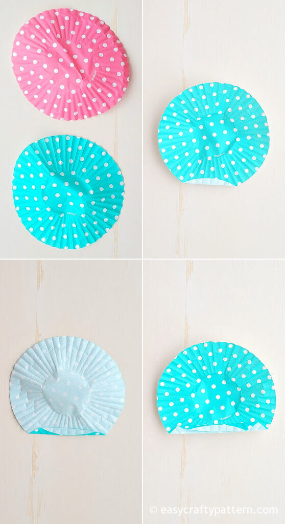 Folding pink and blue cupcake liners.