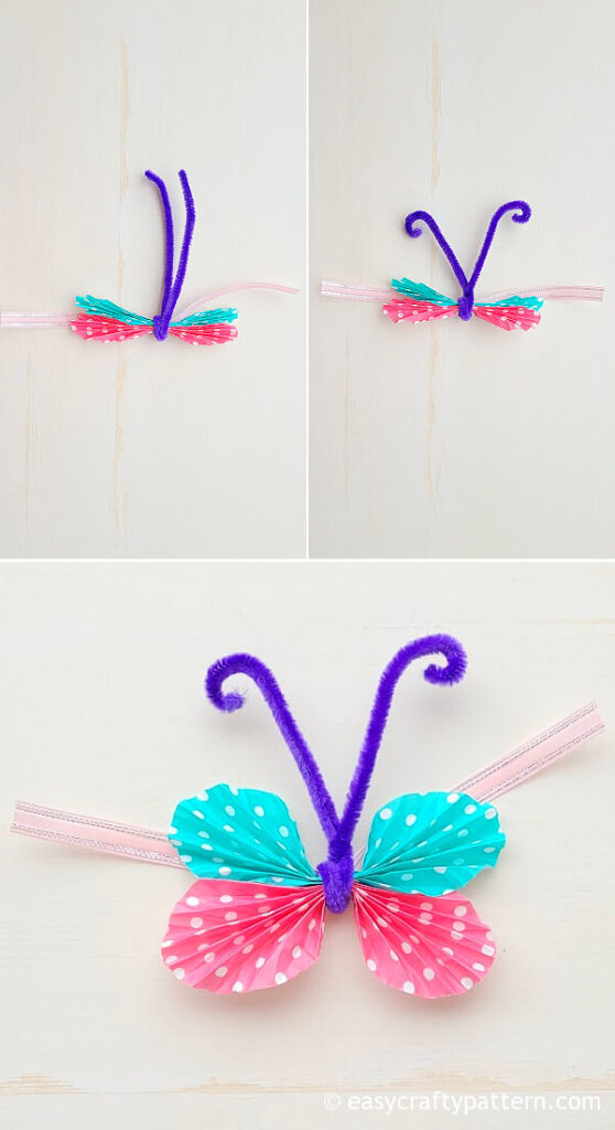 Paper butterfly with ribbon.