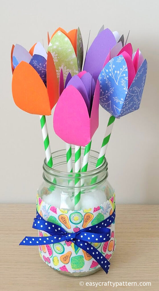 Colorful paper tulip on mason jar.