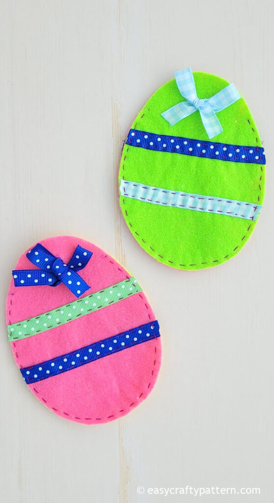 Green and pink felt egg pouch.