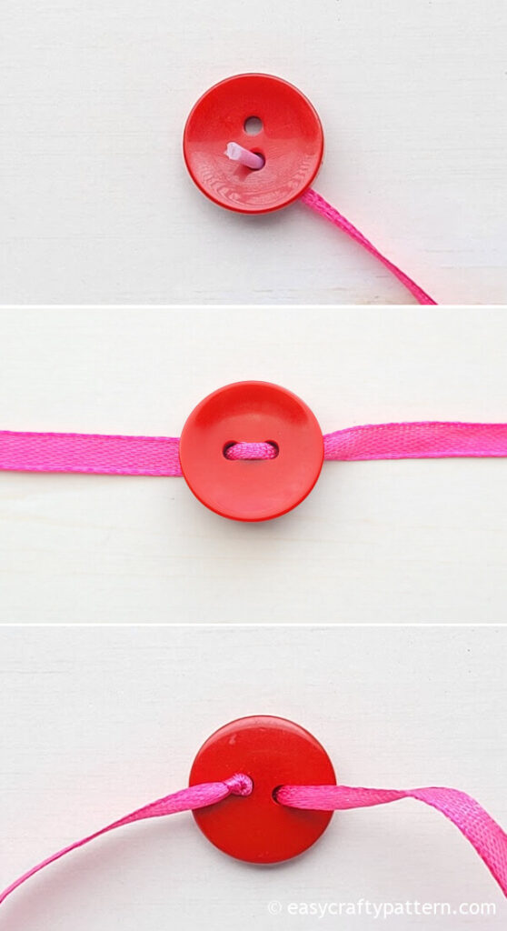 Red button on ribbon.